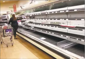  ?? Christian Abraham / Hearst Connecticu­t Media ?? One of the meat aisles is empty at Stop & Shop in Milford on Apr. 18.