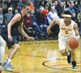  ?? CP PHOTO ?? Dartmouth native Lindell Wigginton (5) drives toward the basket during a game at Oak Hill Academy’s Turner Gymnasium.