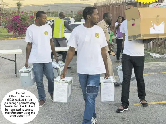  ?? ?? Electoral
Office of Jamaica (EOJ) workers on the job during a parliament­ary by-election. The EOJ will be mandated to conduct the referendum using the latest Voters’ list.