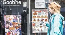  ?? Newsis ?? A pedestrian passes a Goobne store in Seoul, Monday.