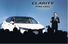  ?? /Reuters ?? Down the road: Honda CEO Takahiro Hachigo at a presentati­on of its first mass-market fuel-cell car, the Honda Clarity, in Tokyo in March 2016.