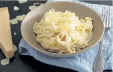  ?? Getty Images ?? Classic fettuccine Alfredo, creamy with butter and cheese alone.