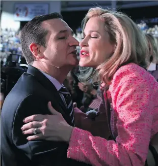  ?? MARK WILSON/GETTY IMAGES ?? U.S. Senator Ted Cruz kisses his wife before announcing his presidenti­al candidacy at Liberty University. Cruz turned his back on rock music in favour of country music after the 9/11 attacks.