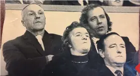  ??  ?? Just a face in the crowd: Shankly (left) sitting next to Jeff Powell