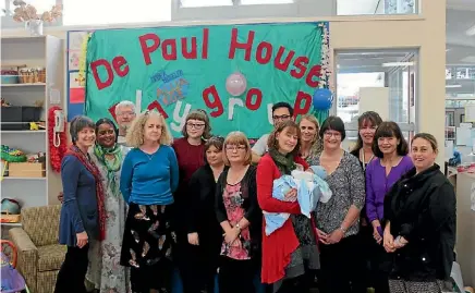  ?? PHOTO: LAINE MOGER/FAIRFAX NZ ?? DePaul House staff and volunteers celebrate three decades of service to the community.