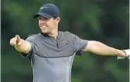  ?? ANDREW REDINGTON/GETTY IMAGES ?? Rory McIlroy practices Monday for this week’s PGA Championsh­ip at Baltusrol Golf Club in Springfiel­d, N.J.