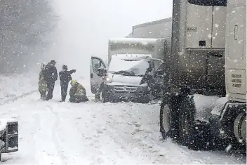  ?? The Associated Press ?? ■ This image provided by Virginia State Police shows part of a multi-vehicle crash on Interstate 81 in Roanoke County, Va., on Sunday.