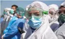  ??  ?? Medics gather as part of a show of support for healthcare workers and patients in Mosul, Iraq, on Tuesday. Photograph: Zaid Al-Obeidi/AFP via Getty Images