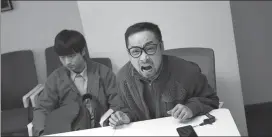  ?? ?? A scene from the movie features the two protagonis­ts, portrayed by comedians Song Muzi (right) and He Wenjun.
