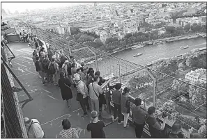  ?? Rick Steves’ Europe/CATHY LU ?? Paris views are best from the Eiffel Tower’s second level — closer to the sights.