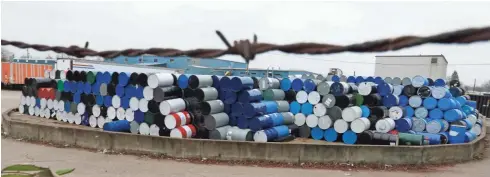  ?? MIKE DE SISTI ?? Drums are stacked outside the IndyDrum plant in Indianapol­is. The plant is part of the Container Life Cycle Management group of drum reconditio­ners.