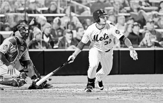  ?? ROBERT DEUTSCH, USA TODAY SPORTS ?? Mets outfielder Michael Conforto hit three home runs in 12 postseason games in 2015, including this one vs. the Royals.