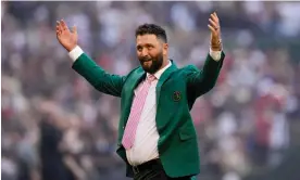  ?? ?? Jon Rahm, the Masters champion, throws out the ceremonial first pitch before Game 4 of the baseball World Series. Will an astronomic­al offer lure him to LIV? Photograph: Brynn Anderson/AP