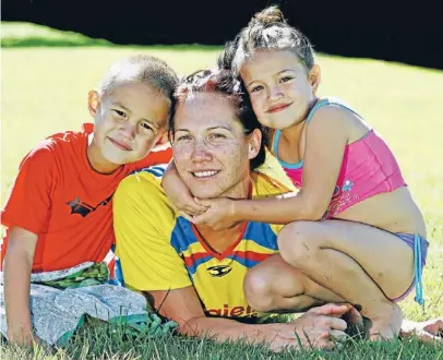  ?? Photo: PHIL REID/FAIRFAX NZ ?? Called up: Pulse netballer Katarina Cooper with her two children Hennessy, left, and Maika. Cooper will make her Silver Ferns debut in this month’s threetest series against Malawi.