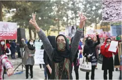  ??  ?? KABUL: Afghan protesters chant slogans during a protest organized by the Solidarity Party of Afghanista­n in Kabul, Afghanista­n. A 22-year-old Afghan woman, was thrown in a hole in the ground and stoned to death by a group of men identified as Taleban...