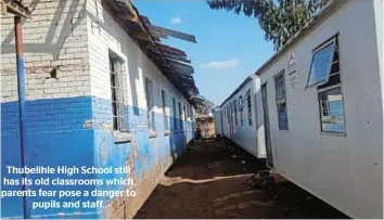  ?? ?? Thubelihle High School still has its old classrooms which parents fear pose a danger to pupils and staff.