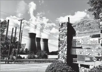  ?? JOHN RABY/AP ?? Rolling back pollution controls on coal-fired power plants will hit northern W.Va. coal country hard, an EPA analysis says.