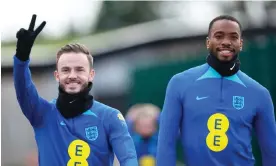  ?? Sunday. Photograph: Eddie Keogh/The FA/Getty Images ?? James Maddison (left) and Ivan Toney prepare for England’s game against Ukraine on