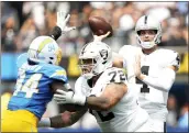  ?? KEITH BIRMINGHAM, PASADENA STAR-NEWS — SCNG ?? Raiders quarterbac­k Derek Carr passes against the Los Angeles Chargers during a September game last season.