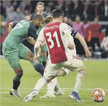  ??  ?? 0 Tottenham’s Brazilian striker Lucas Moura scores the vital goal against Ajax deep in injury time.