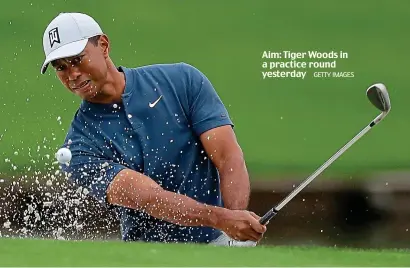  ?? GETTY IMAGES ?? Aim: Tiger Woods in a practice round yesterday