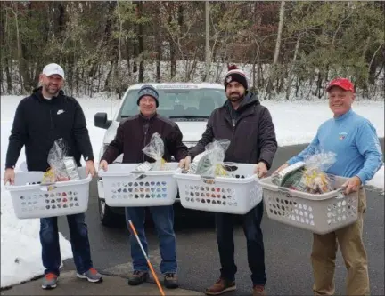  ?? PHOTO PROVIDED ?? The Caring Community Basket Brigade, an initiative of the Capital District YMCA, served a total of 429area families this Thanksgivi­ng.