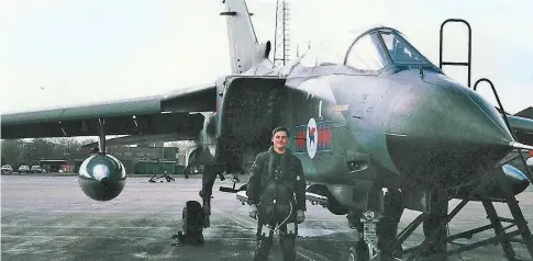  ??  ?? Top gun: Laurence Williams with a Royal Air Force Tornado. The jet is due to be decommissi­oned next year