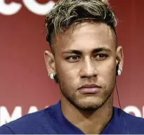  ?? Toru Yamanaka - 13.jul.17/AFP ?? O atacante Neymar está com o Barcelona nos EUA, mas sua transferên­cia para o PSG é dada como certa