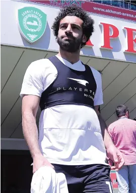  ?? Picture: AFP ?? ON THE MOVE. Egyptian forward Mohamed Salah arrives to take part in a training session at the Akhmat Arena Stadium in Grozny yesterday.