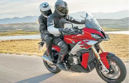  ??  ?? Left: Improved midrange torque and fuel consumptio­n for BMW’s superbikee­ngined adventure motorcycle. Far left: The digital instrument panel offers tailor-made screen displays for a range of different purposes.