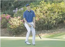  ?? MATT SLOCUM/THE ASSOCIATED PRESS ?? Jordan Spieth reacts to a missed putt Saturday on the 13th hole at the Masters in Augusta, Ga.