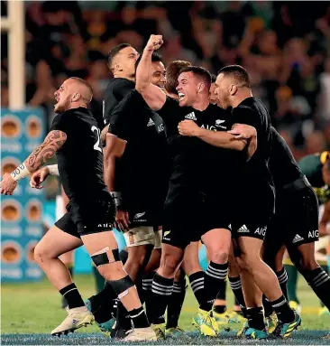  ?? AP ?? Ryan Crotty, centre, leads the celebratio­ns after Richie Mo’unga’s last-gasp conversion gave the All Blacks a remarkable win over South Africa.