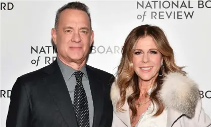  ??  ?? Tom Hanks and Rita Wilson have been diagnosed with coronaviru­s. Photograph: Dia Dipasupil/FilmMagic