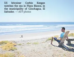  ?? — AFP photos ?? US bitcoiner Corbin Keegan watches the sea in Playa Blanca, in the municipali­ty of Conchagua, El Salvador.