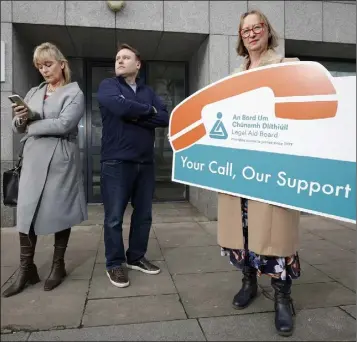  ?? Photo by Conor Mc Cabe ?? Launching the new call back service for the Family Mediation Service at the Legal Aid Board, Fiona Mc Auslan Director of the Family Mediation Service with help from Legal Aid Board staff Garrett Murphy and and Carol Gallagher.