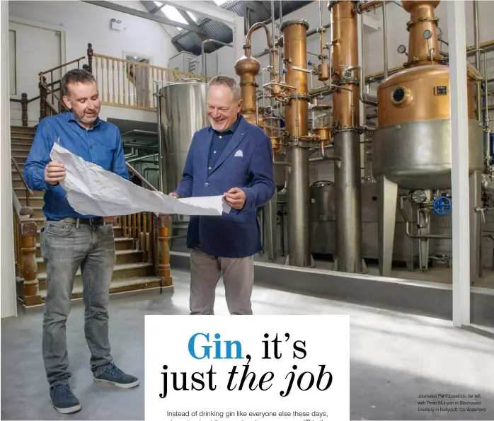  ??  ?? Journalist Pat Fitzpatric­k, far left, with Peter Mulryan in Blackwater Distillery in Ballyduff, Co Waterford
