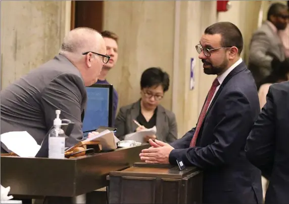  ?? STUART CAHILL — BOSTON HERALD ?? City council President Ed Flynn speaks with councilor Ricardo Arroyo as the Boston City Council takes up a new day of legislatio­n on Wednesday.