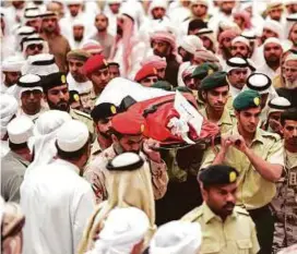  ?? A.K Kallouche/Gulf News ?? For more stories, photos log on to: The body of Abdullah Mohammad Eisa Obaid Al Kaabi being brought for the funeral prayers in Al Ain.