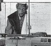  ?? NANCY STONE/CHICAGO TRIBUNE ?? A mural of Dennis Rodman caused many a gapers block along the Kennedy Expressway in March 1996.