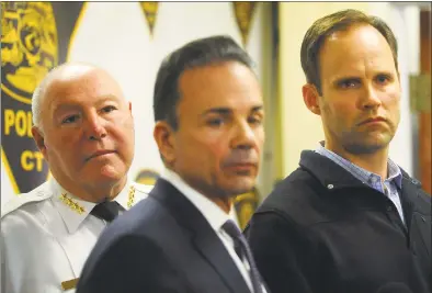  ?? Brian A. Pounds / Hearst Connecticu­t Media ?? From left; Bridgeport Police Chief A.J. Perez, Mayor Joe Ganim, and detective bureau head Captain Brian Fitzgerald address the media at police headquarte­rs over the Tuesday night killing of 12-year-old Clinton Howell.