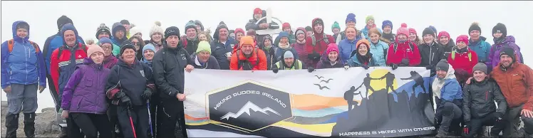  ?? (Pic: Joe Prendergas­t) ?? The proud gang of hikers atop Galtymore. The group from Kilbehenny raised over €10,000 for a local family affected by Motor Neurone Disease.