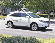  ?? Eric Risberg / Associated Press file photo ?? A Google self-driving Lexus from 2014.