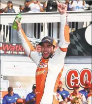  ?? Sarah Crabill / Getty Images ?? Chase Elliott celebrates in Victory Lane after winning the Monster Energy NASCAR Cup Series GoBowling at The Glen Sunday at in Watkins Glen, N.Y.