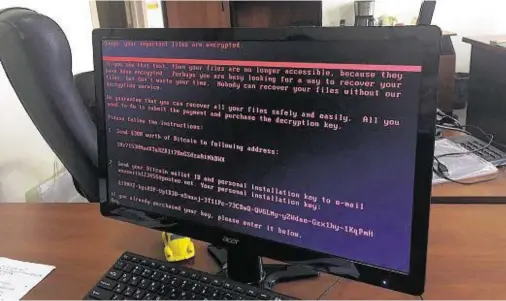  ??  ?? WARNING: Hackers sent notices that computer files were being held to ransom as part of a massive internatio­nal cyber attack yesterday