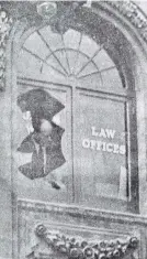  ?? PHOTO: STAFF PHOTOGRAPH­ER ?? Looking for clues . . . Detective Sergeant E. R. Tyson examines a window shattered by the blast in James Ward’s office.