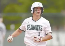  ?? ?? Junkins rounds third after hitting a three-run home run in the sixth inning.