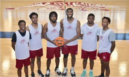  ?? (Pine Bluff Commercial/I.C. Murrell) ?? Pine Bluff High School seniors Davonte West (left), Jabbar Spellman, Keyonte Stringer, Jordon Harris, X’Zaevion Barnett and Jerry Hudson will get a crack at bringing home the school’s first state championsh­ip in eight years Thursday night against conference rival Lake Hamilton in Hot Springs.