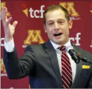  ?? JIM MONE — THE ASSOCIATED PRESS ?? P.J. Fleck gestures during his news conference Friday. The former Western Michigan head coach was named Friday to take over at the University of Minnesota.