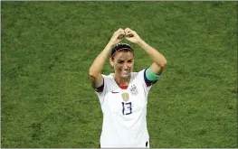  ?? FRANCOIS MORI – THE ASSOCIATED PRESS ?? Alex Morgan has encountere­d a lot of attention from defenders at the Women’s World Cup, and she said the physical play she’s dealt with “just comes with the territory.”