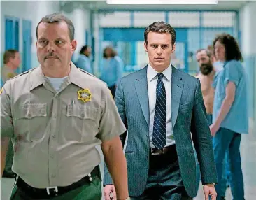  ?? [PHOTO PROVIDED BY PATRICK HARBRON/NETFLIX] ?? Jonathan Groff, background, stars in “Mindhunter” on Netflix.